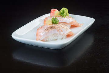 japanese cuisine. sushi salmon on the background