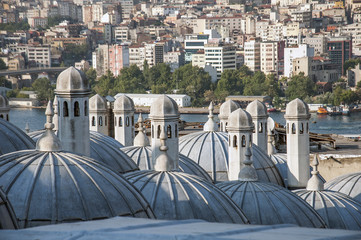 View across the domes of the shopping arcade from the Suleymaniye Mosque towards the city of Istanbul