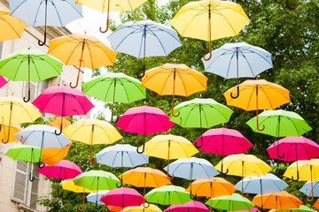 Fototapeta na wymiar colorful umbrellas hanging in the air