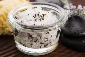 Homemade skin exfoliant (skin scrub) of sea salt, olive oil and