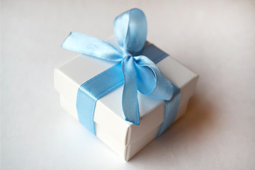 Obraz premium White box with blue tape