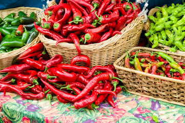 Red hot peppers in baskets