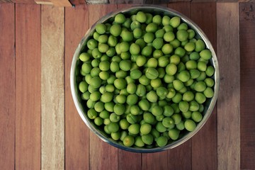 green plum on wood board