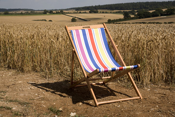 Open deckchair in countryside