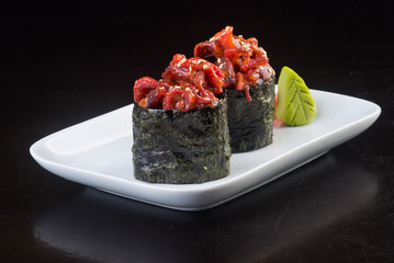 japanese cuisine. sushi octopus on the background