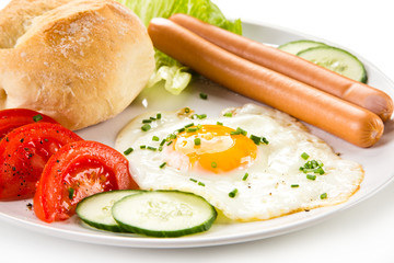 Breakfast - fried egg and sausages 