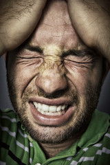 Frowning handsome guy