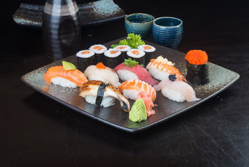 japanese cuisine. sushi set on the background
