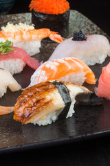 japanese cuisine. sushi set on the background