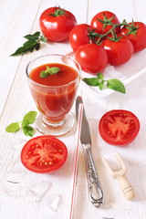 Bunch of tomatoes and tomato juice
