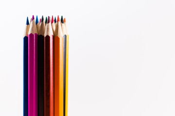 Vertical Multicolored Pencils on White Background