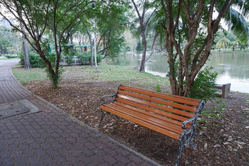 A bench in the park.