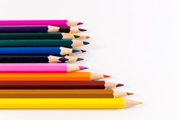 Multicolored Pencils on White Background