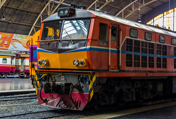 Thai train arriving at station