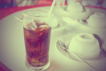 Soft drink on the table - vintage effect
