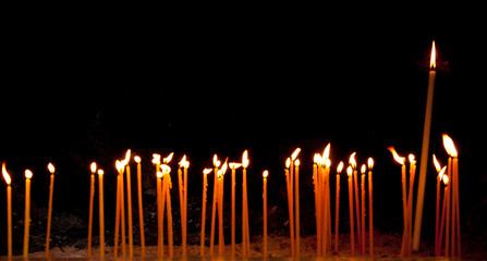 Burning religious candles