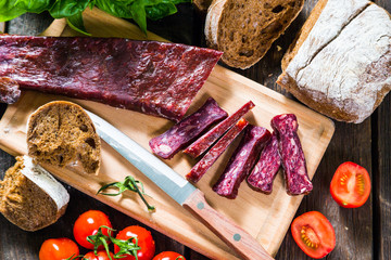 Armenian sudzhuk. Sausage, bread and cherry tomatoes
