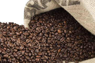 Coffee beans in coffee bag made from burlap on white