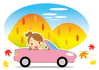 秋　ドライブを楽しむ女性