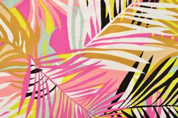 Fototapeten Colorful tropical leaves pattern on fabric. Pink, yellow, black and white palm leaves print as background. © luanateutzi