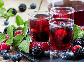 Fresh berry drink with blueberries, blackberries and raspberries