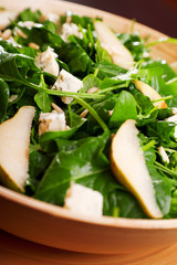 Fresh spinach salad with blue cheese, pears and honey