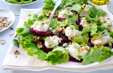 Beet Salad with goat cheese, walnuts, greens and herbs