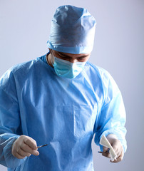 Surgeon in uniform close-up ready to step