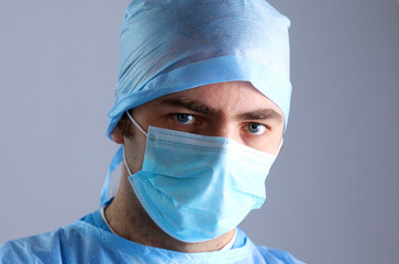 Surgeon in uniform close-up ready to step