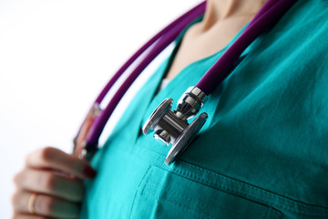 young doctor standing with a stethoscope on a white backgro