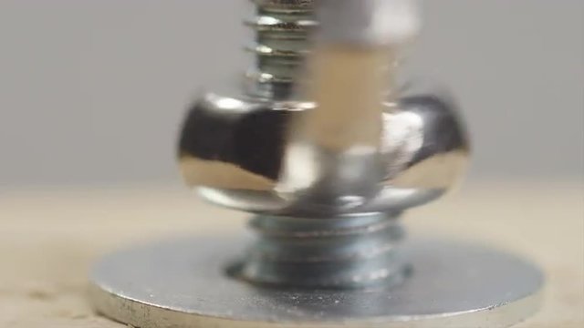 Hand Tightening a Wing Nut