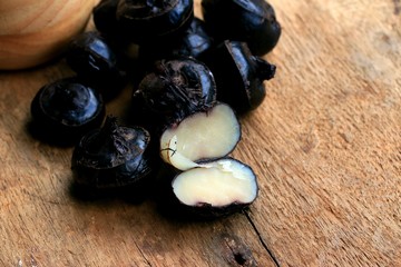 Chinese water chestnut on wood vintage