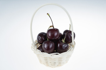 Ripe cherries basket