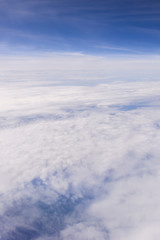 clouds sky, view from the window of an airplane flying in the cl