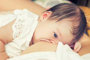 Obraz na płótnie Canvas Breastfeeding of infant