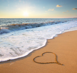 Heart on beach.
