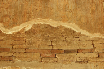 Old brick wall cracked concrete vintage background
