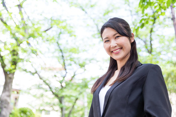 asian businesswoman in the park