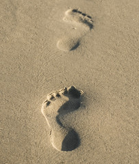 Fototapeta na wymiar footprints on a beach