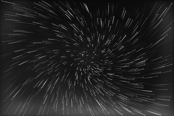 abstract long exposure of vortex star trails background black and white