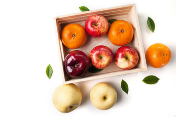 vitamin c fruit in wooden box on white background
