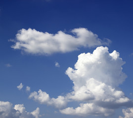 soft white clouds against blue sky.