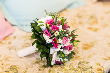 Bridal bouquet of various flowers.