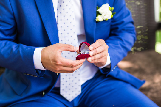 Man Holding Box With Ring 