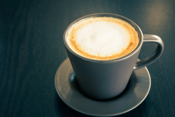 Coffee cup on the table.