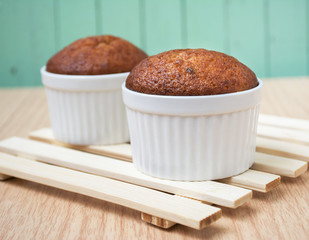 banana muffin cake on wooden background 