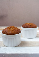 banana muffin cake on wooden background 