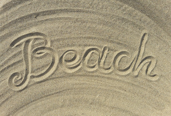 beach text on the sand