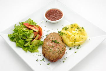 Russian traditional cutlet with mashed potatoes isolated on white