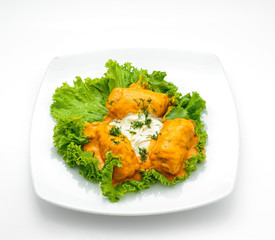 Forcemeat wrapped in cabbage leafes and boiled isolated on white